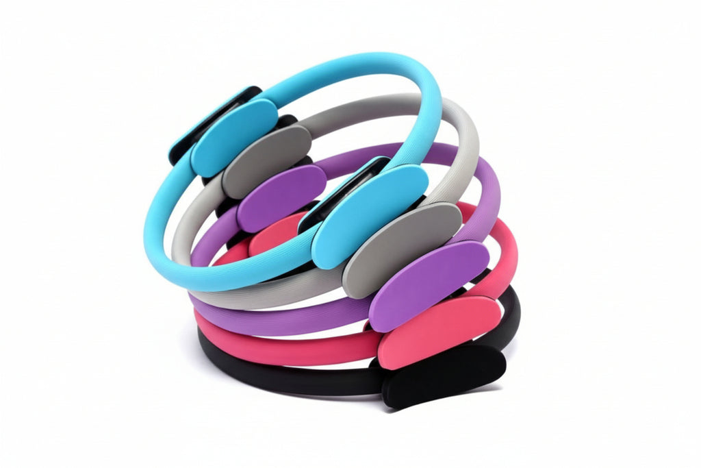 Colorful stack of Pilates resistance rings for toning arms, legs, and core during workouts.